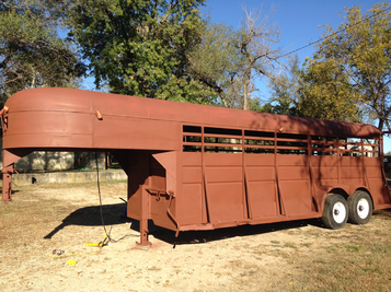 Cattle trailer for moving miniature Jerseys tot eh northwest