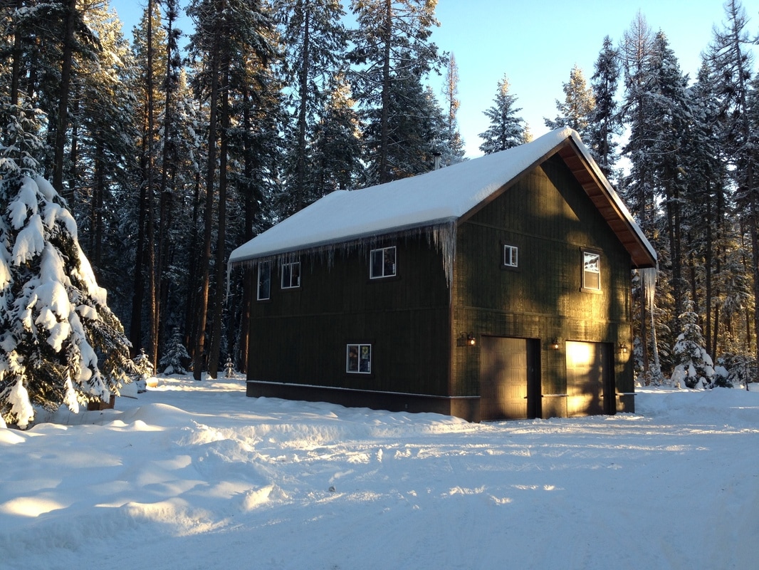 Winter farmhouse in north Idaho on the Homestead in the woods